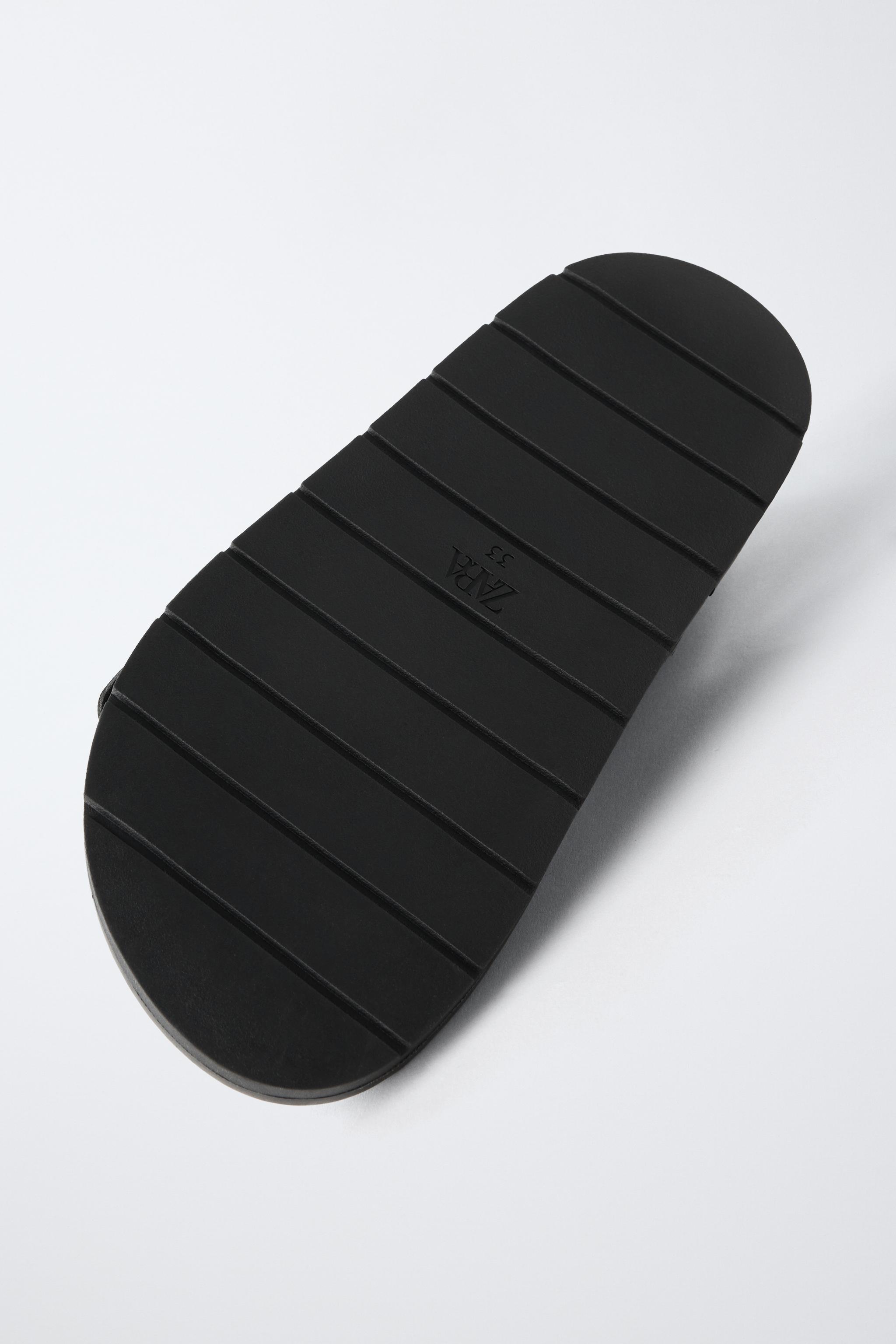 BUCKLED SANDALS